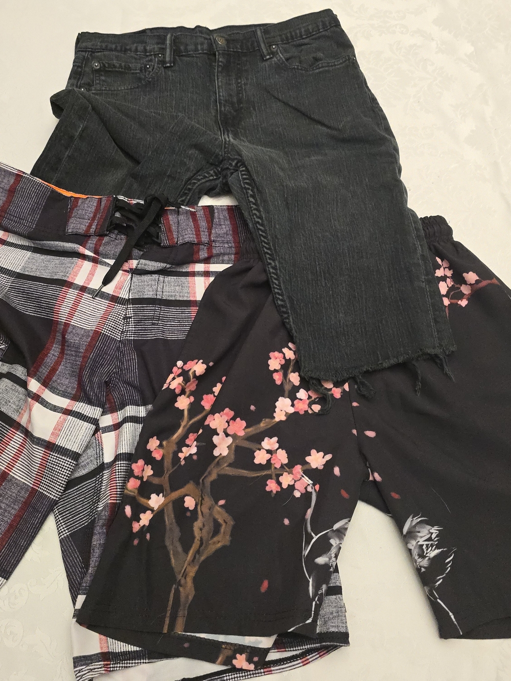 Three Men's Shorts Bundle - Black Denim, Plaid, and Floral